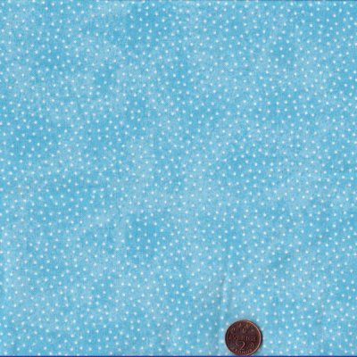 7006 Bomullsflanell med små vita prickar på ljusblå bakgrund., tygbredd 110 cm