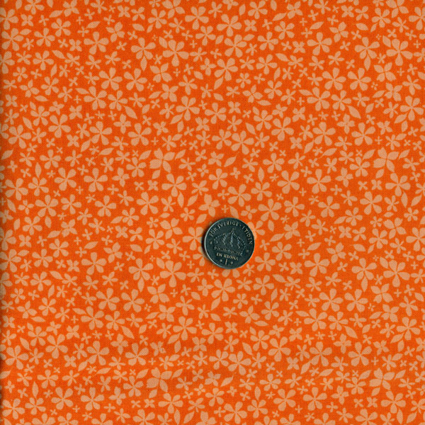2501, små blommor på orange botten, tygbredd 110 cm