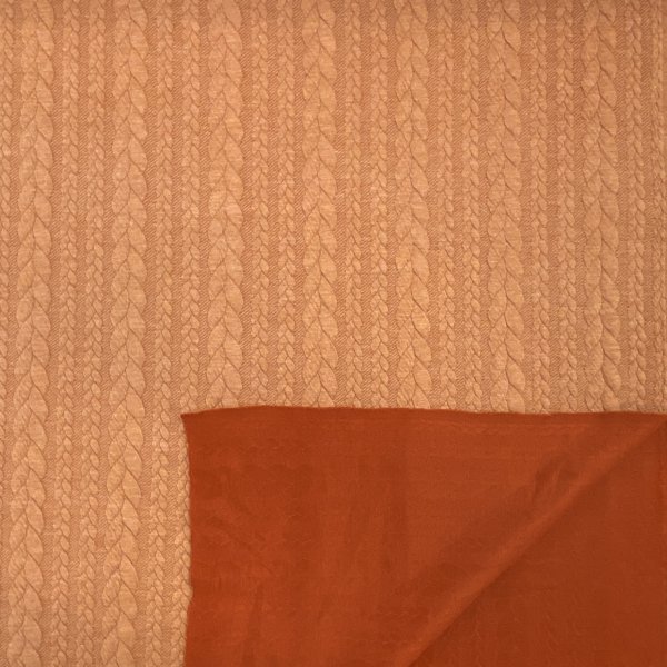 038, Jaquard jersey i rostfärg, Tygbredd 150 cm