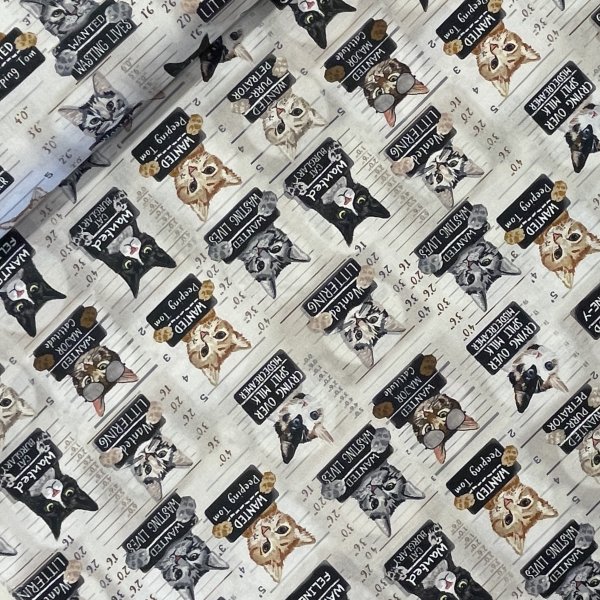 26135, tygbredd 110 cm, katter efterlysta av lagens långa arm.